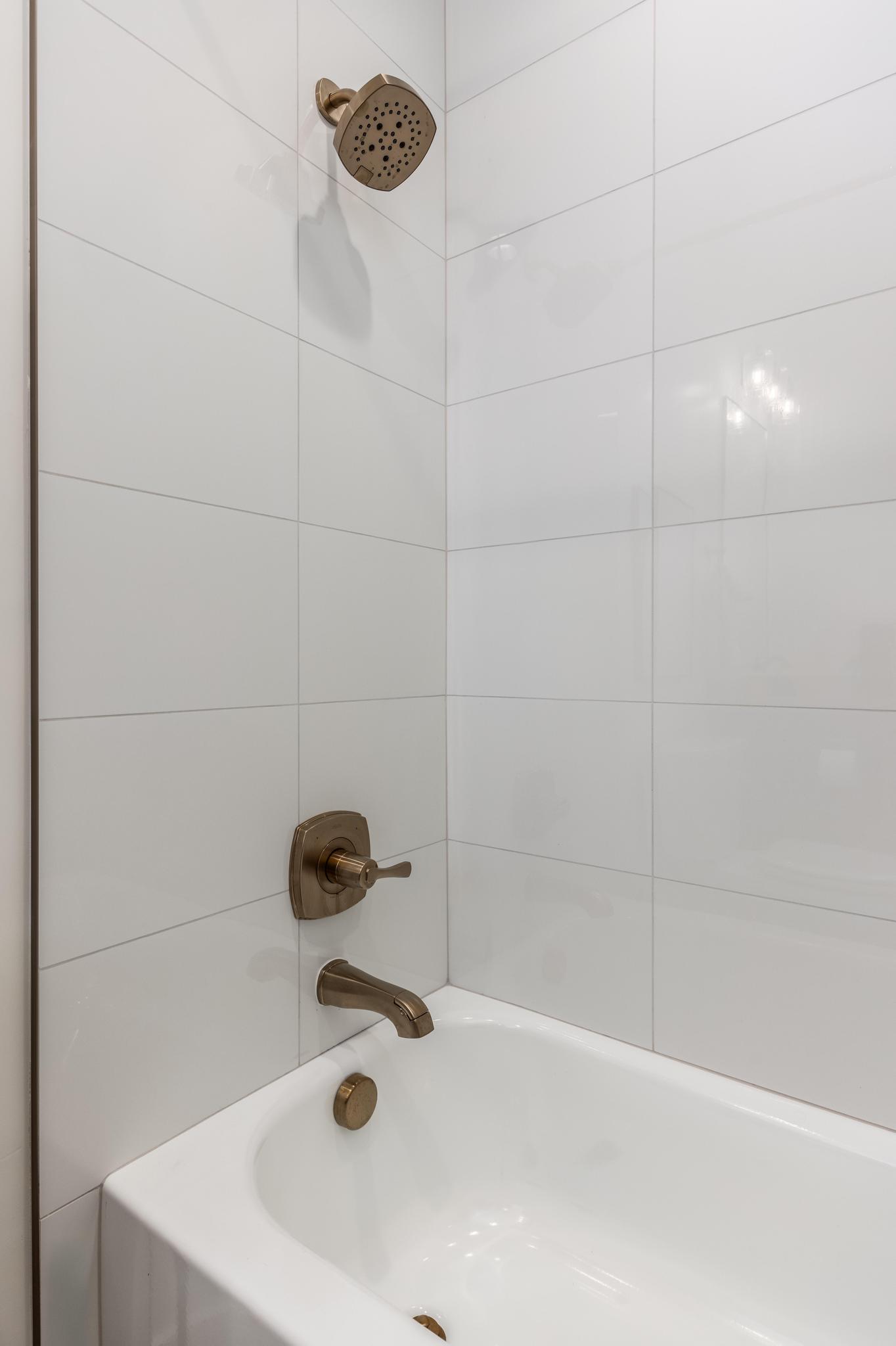 Bathroom featuring bathtub / shower combination