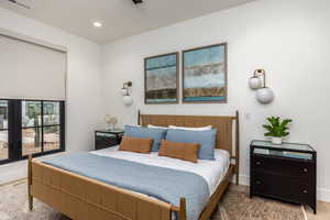 Bedroom with baseboards and recessed lighting