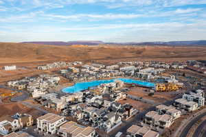 View of property location featuring a mountain backdrop and nearby suburban area