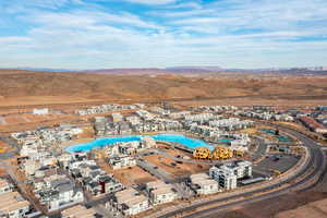 View of property location with a pool and mountains