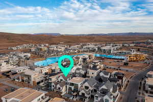 Drone / aerial view of a pool and mountains