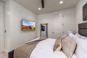 Bedroom featuring recessed lighting and a ceiling fan
