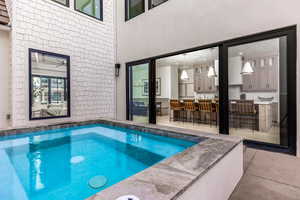 Swimming pool featuring a patio area