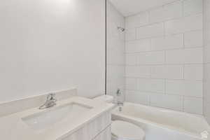 Full bath with  shower combination and vanity