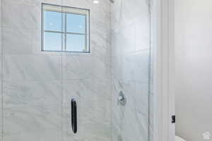 Full bath featuring a stall shower