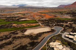 Aerial view of property's location featuring mountains