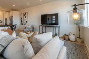 Living room featuring recessed lighting and baseboards