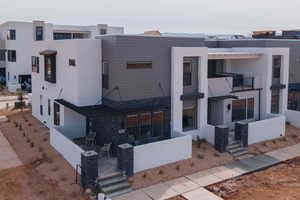 View of front of property featuring stucco siding