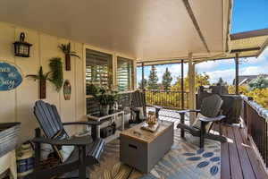 Fully covered, wraparound Trex deck