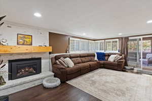 Basement family room with gas fireplace and wet bar