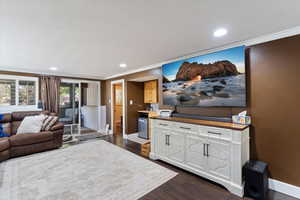 Basement family room with gas fireplace and wet bar