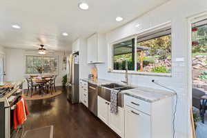 Shaker cabinets and tile backsplash