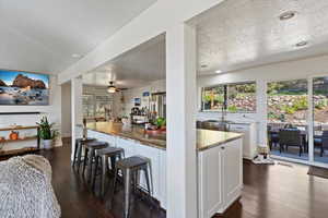 Granite countertops, gas range and oven, large SS sink