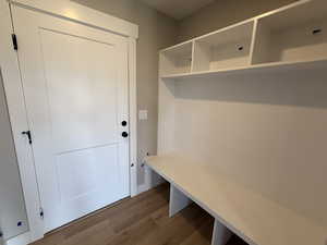 Mudroom with dark wood-style flooring