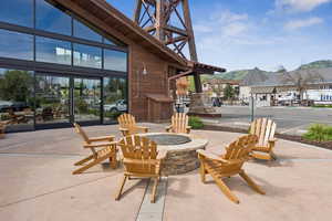 View of patio / terrace with a fire pit