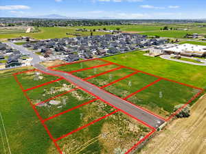 Aerial view of residential area with property parcel outlined