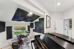Dining room featuring a baseboard radiator and recessed lighting