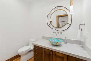 Bathroom featuring vanity and light wood-type flooring