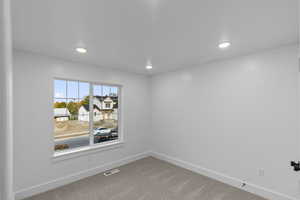 Carpeted bedroom 4 with recessed lighting