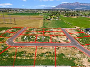 View of property location with a mountain backdrop and property boundaries highlighted