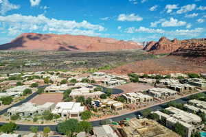 Aerial view of residential area with a mountain backdrop