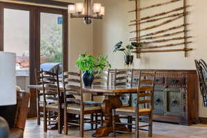 Dining space featuring a chandelier