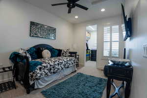Bedroom with carpet, recessed lighting, and ceiling fan