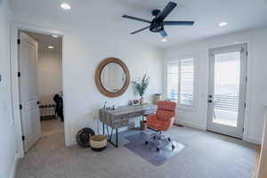 Home office with light colored carpet, recessed lighting, and ceiling fan