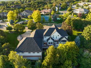View from above and backside of property showing height of sport court and new Trex deck and 2nd floor balcony.