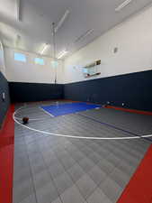View of private personal  indoor sport court/recreation area to enjoy year round!