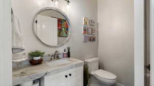 Half  Bathroom off of great room for company access  with vanity and toilet