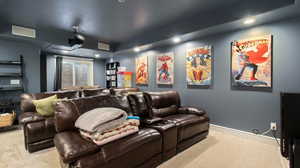 Cinema room with carpet floors and recessed lighting- Could be repurposed to be a 7th bedroom.