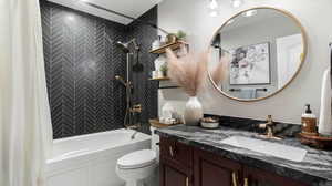 Full bathroom with shower / tub combo with curtain and vanity