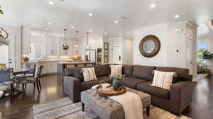 Bright and inviting great room for cozy evenings with fireplace and open space for entertaining and guests.
