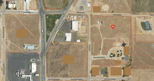 Aerial overview of property's location with property boundaries highlighted