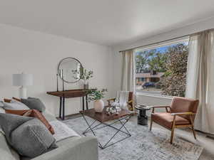 Living room with light colored carpet