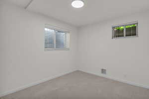 Bedroom with carpet and baseboards