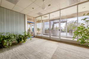 Building lobby featuring a paneled ceiling