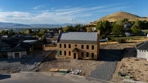 Aerial view of residential area with a mountainous background