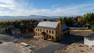 Aerial perspective of suburban area featuring mountains