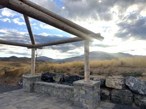 View of patio featuring a mountain view