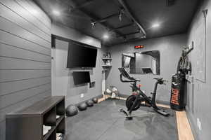 Exercise area featuring baseboards