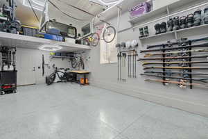 Garage featuring baseboards