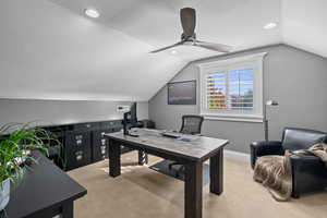 Office with light carpet, a textured ceiling, lofted ceiling, recessed lighting, and a ceiling fan
