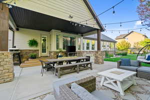 View of patio / terrace with outdoor dining area and an outdoor living space