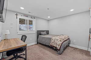 Bedroom featuring carpet, an office area, and recessed lighting
