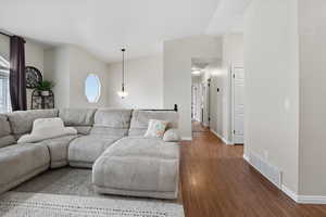 Living area with wood finished floors