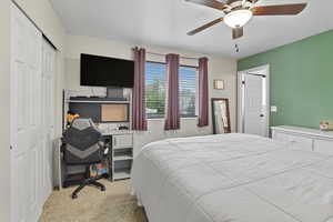 Primary bedroom with door to bathroom