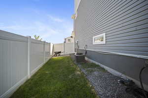 Fenced backyard featuring a patio area