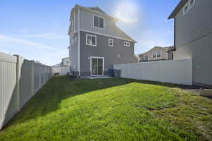 Back of property featuring a patio area and a fenced backyard